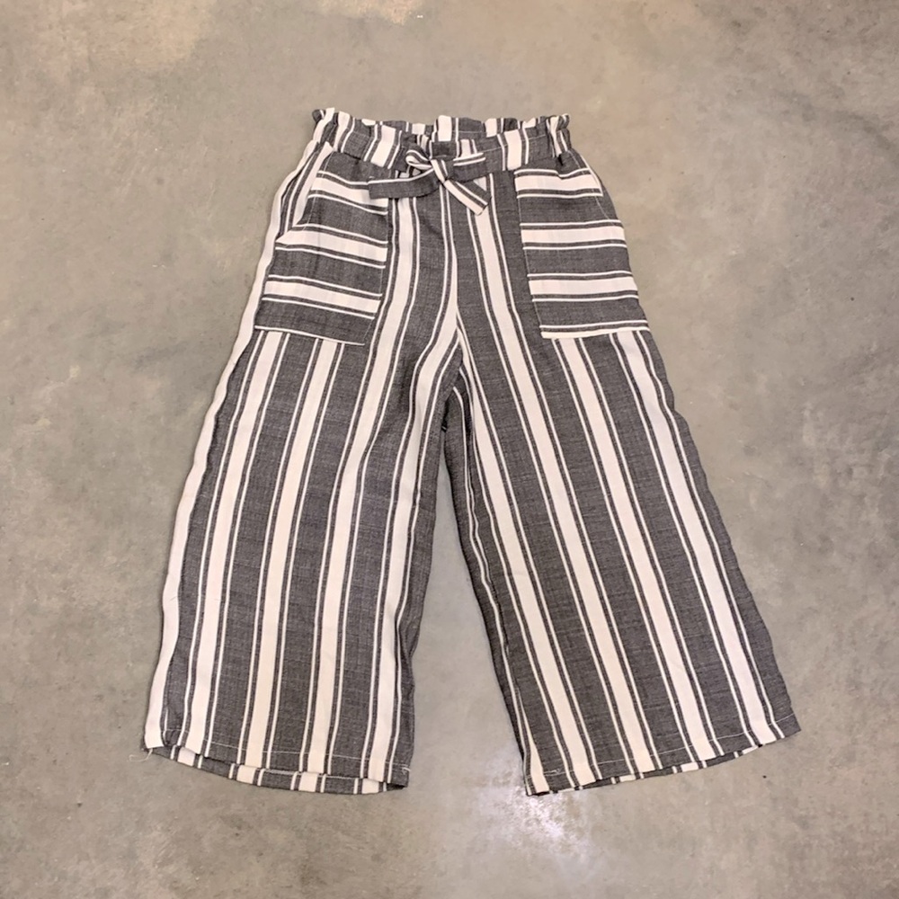 This is a girls formal black-and-white dress pants
